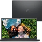Notebook Dell Inspiron 15 com tela ligada mostrando duas pessoas deitadas na grama