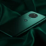 Fx Elegant product shot of Motorola Moto G75 placed on silk fabric with dramatic side lighting creating beautiful shadows and highlights 3