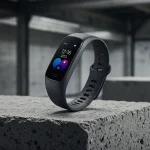 Fx Samsung Galaxy Fit3 fitness tracker artistically placed on concrete surface with industrial aesthetic 2