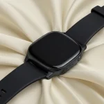 Fx Samsung Galaxy Fit3 smartwatch elegantly placed on silk fabric with luxury presentation 4