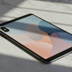 Fx Xiaomi Redmi Pad SE 11 tablet on a clean marble surface with geometric shadows high contrast artistic photography style 2