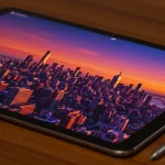 Fx Close up detailed shot of Samsung Galaxy Tab S10 FE screen displaying vibrant colors with S Pen stylus resting beside it 3