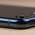 Fx Close up of Xiaomi Redmi Note 13 Pro Plus 5G bottom edge showing USB C port and speaker grilles macro photography with sharp details 1