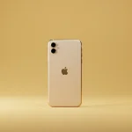 Fx Minimalist composition of iPhone 16e against solid color background perfect centered positioning studio lighting with gradient shadows 2