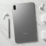 Fx Overhead flat lay photography of Samsung Galaxy Tab S10 FE with S Pen and wireless accessories on marble surface 4