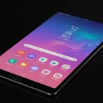 Fx Professional studio shot of Samsung Galaxy Tab S10 FE displaying colorful interface with soft rim lighting 1