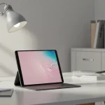Fx Samsung Galaxy Tab S10 FE on clean minimalist desk setup with modern office environment in background 4