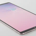 Fx Samsung Galaxy Tab S10 FE positioned at perfect angle showing screen reflection and metallic frame 3