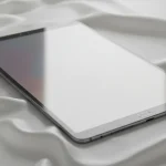 Fx Samsung Galaxy Tab S6 positioned on white silk fabric with elegant draping and soft light 3