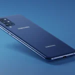 Fx Samsung budget phone photographed from a low angle against a gradient blue background 4