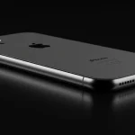 Fx Side view of iPhone 16e showing sleek profile and button details positioned on reflective black surface professional studio lighting commercial photography style 4