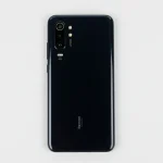 Fx Top down view of Xiaomi Redmi Note 13 Pro Plus 5G showing full device dimensions and proportions professional overhead photography 3