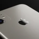 Fx iPhone 16e back panel close up highlighting Apple logo and camera system soft gradient lighting premium material textures visible ultra high definition 1